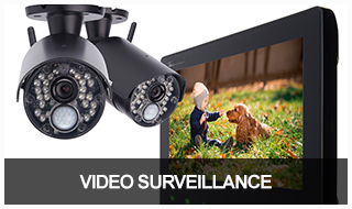 Image of 2 video surveillance cameras with their live feed displaying on a laptop.